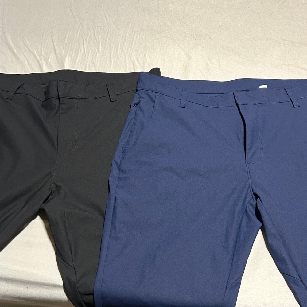 Fabletics The Don Slim Fit pants black and blue pair 36x30